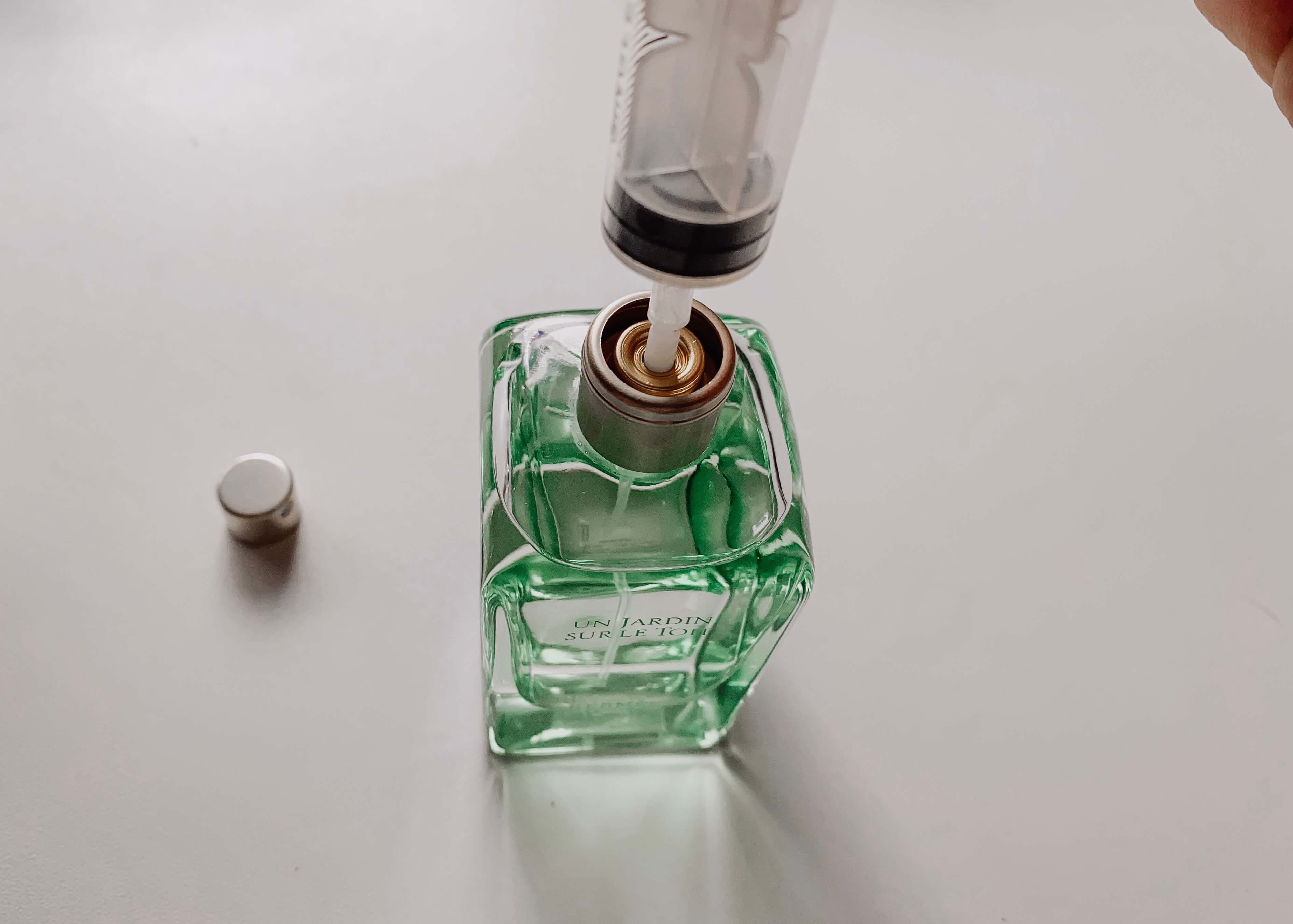 using a syringe to decant perfume